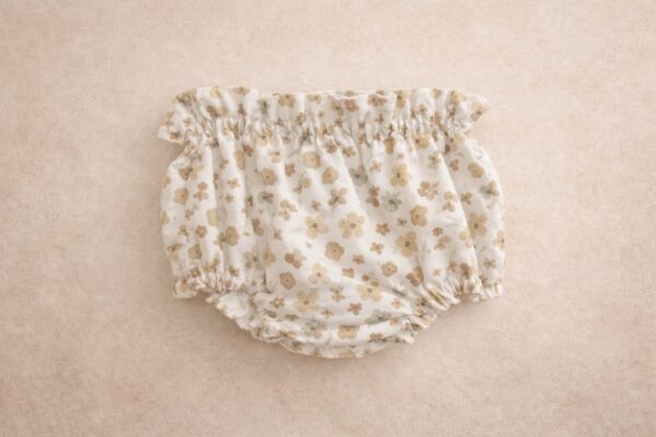 Braguitas flores beige